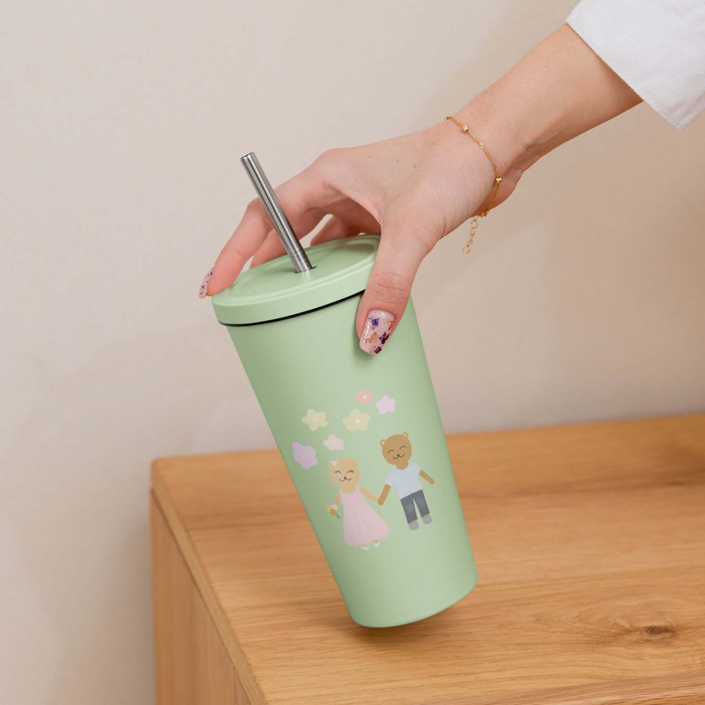 Insulated tumbler with a straw