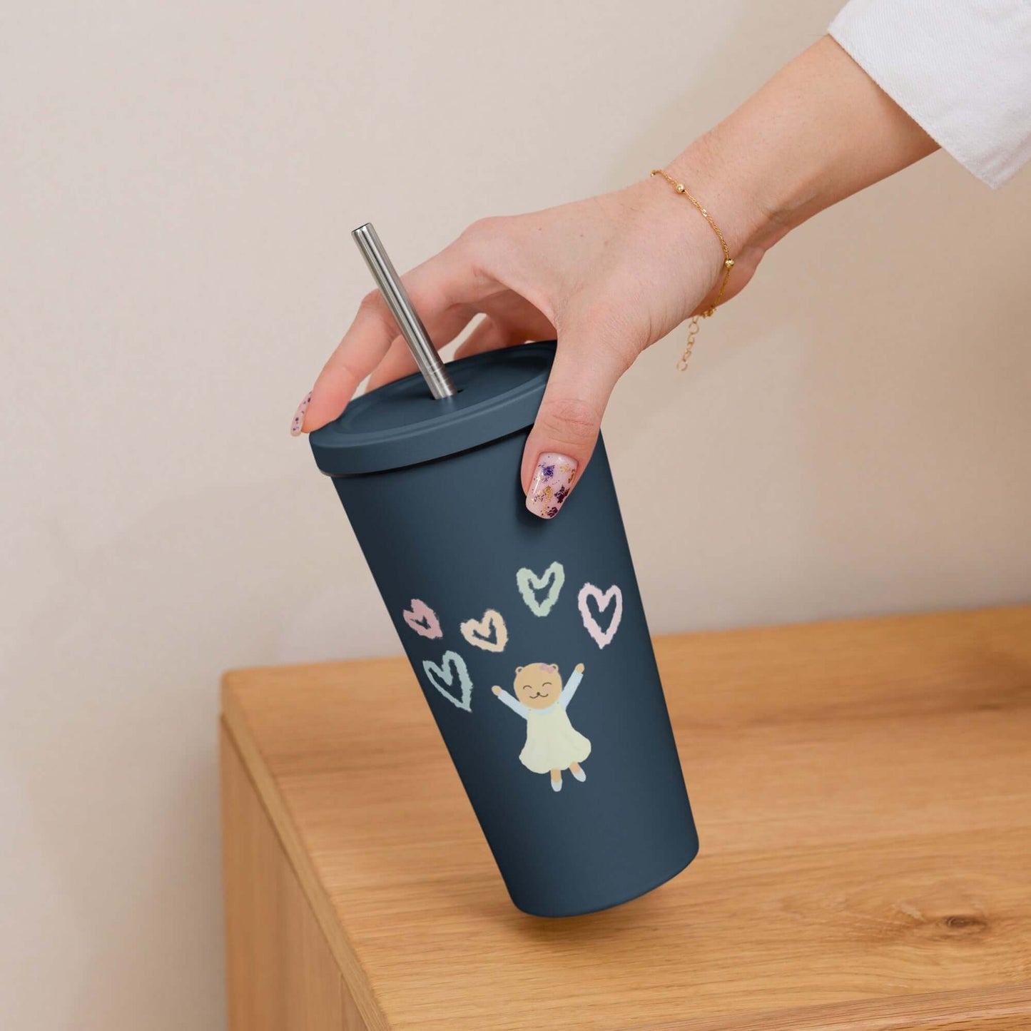 Insulated tumbler with a straw