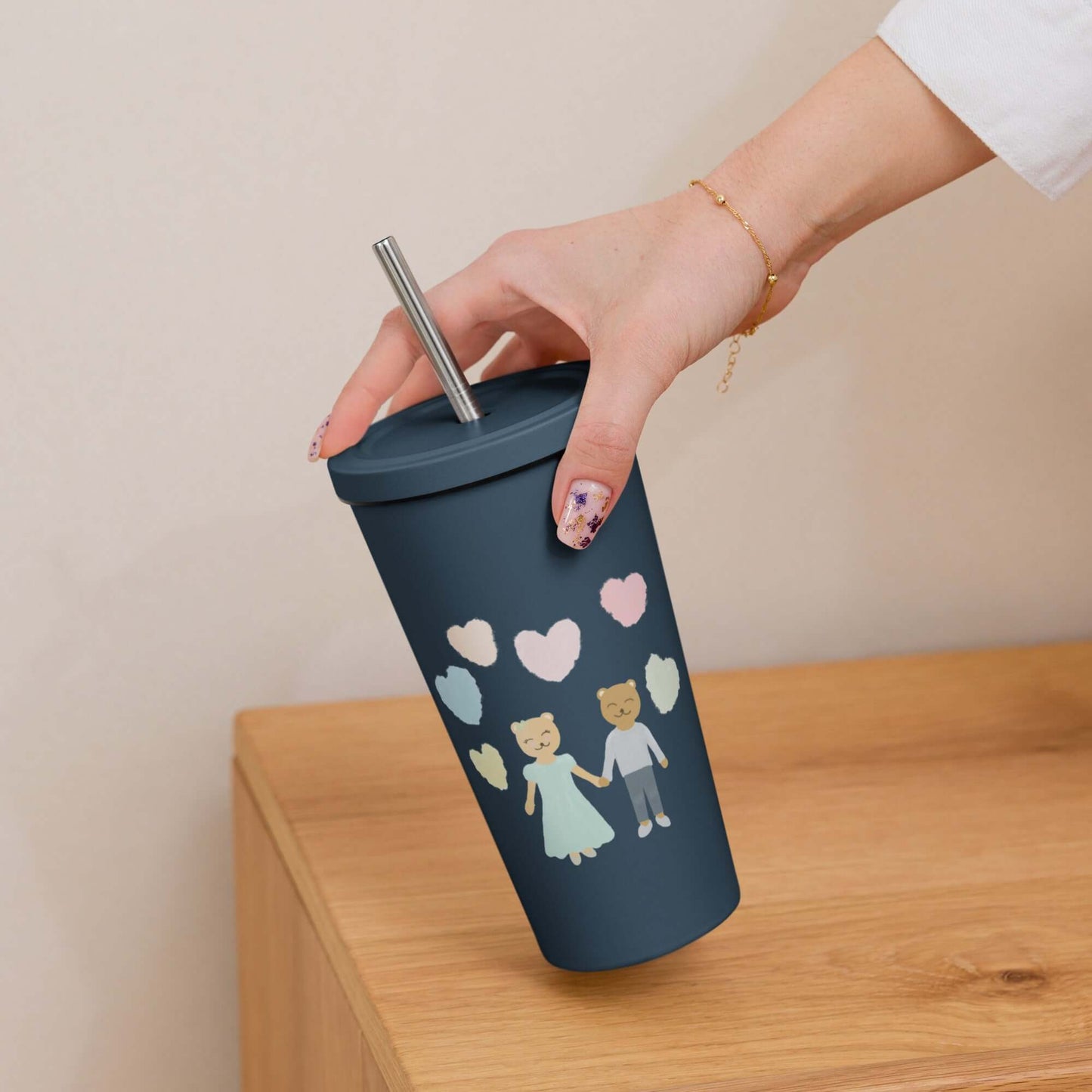 Insulated tumbler with a straw