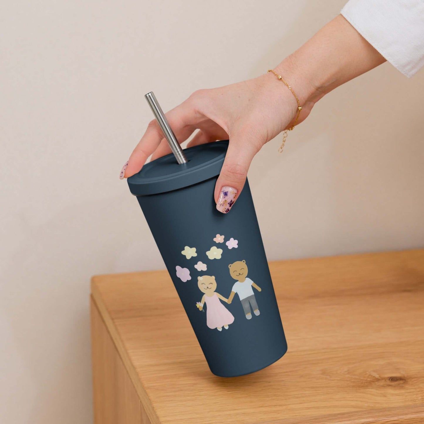 Insulated tumbler with a straw